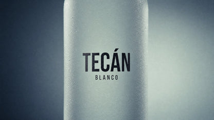 Tecán Blanco — frosted wordmark macro with condensation