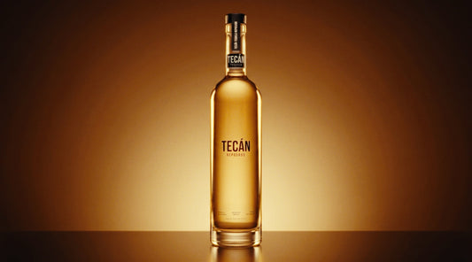 Tecán Reposado — golden studio packshot